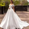 Robe de mariée dos nu style princesse romantique avec col en V