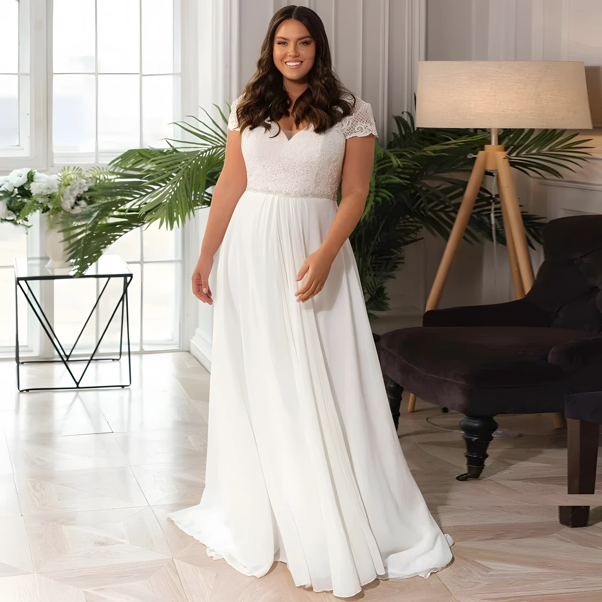 Robe de mariée eugénie avec maintien haut parfait pour grande taille. Une dentelle qui exhibe la poitrine dans une forme de cœur et une jupe en mousseline fluide et légère