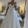 Robe de mariée princesse en mousseline de coton pailleté