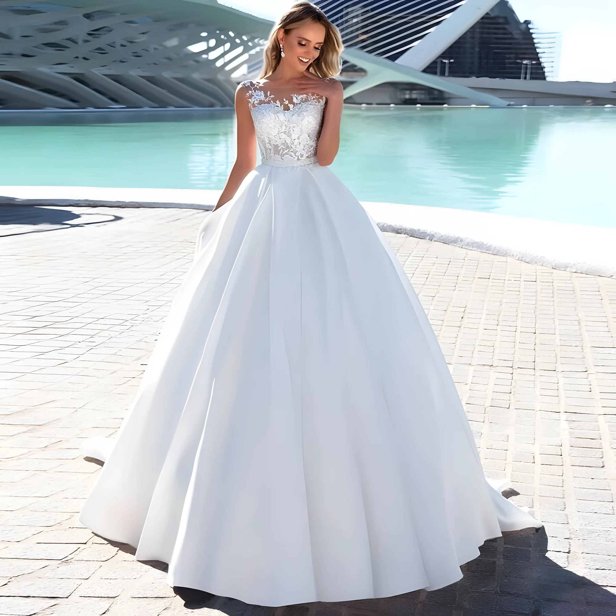 Robe de mariée style romantique avec haut en dentelle et jupe en satin