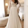 Robe de mariée vintage tendance bohème avec dentelle travaillé et tombé au sol