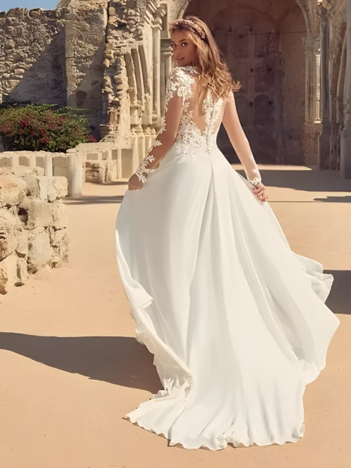 Robe de mariée manches longues dentelle et dos nu