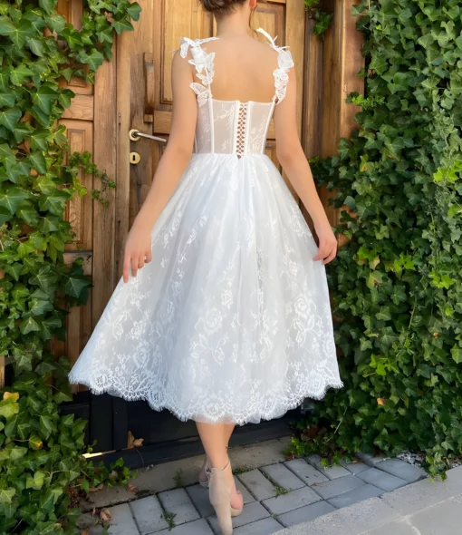 Robe de Mariage vintage en mousseline style années 50 avec jupe longueur midi et dos à moitié nu