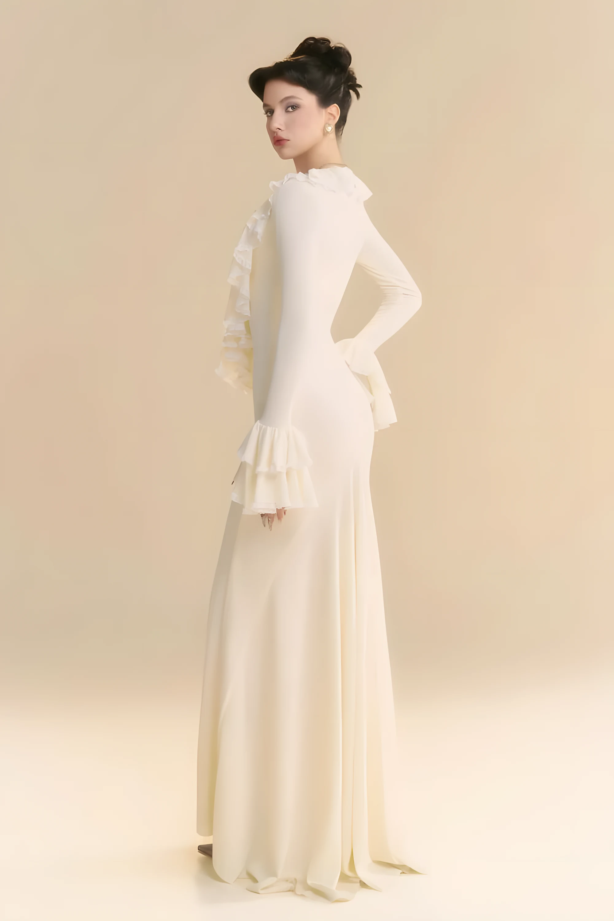 Robe de mariée manches longues et dos couvert