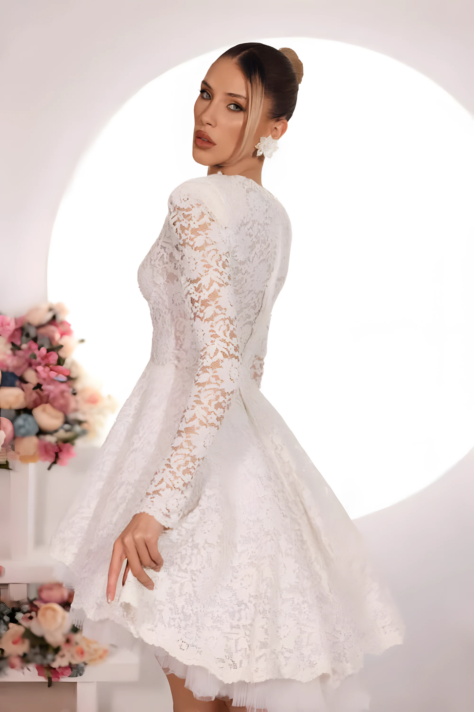 Robe de mariée en dentelle manches longues
