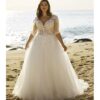 Robe de noce réalisée pour grande taille avec imprimés sur top illusion et jupe silhouette A en tulle